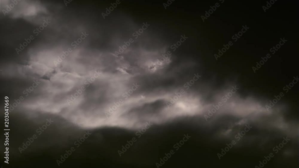 Time-lapse black clouds thickening and filling frame Time-lapse black clouds thickening and filling frame