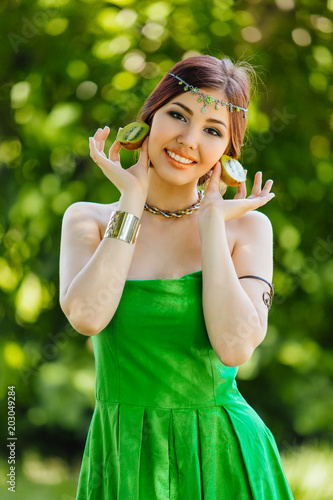 Wallpaper Mural Beautiful young asian woman with kiwi Torontodigital.ca