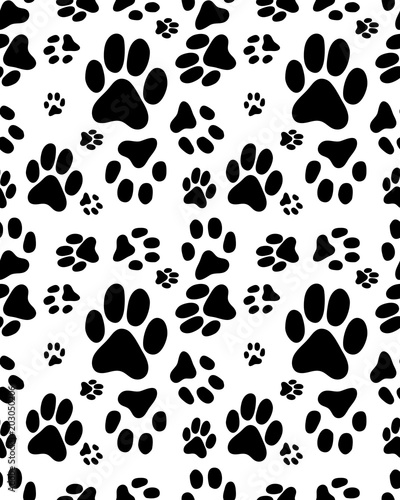 Seamless pattern of print of cats paws on a white background