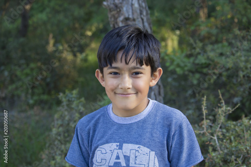 Happy boy is looking at camera in Atakoy,Turkey photo