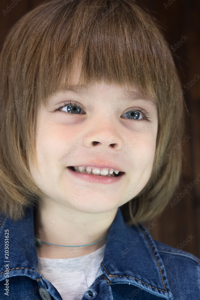 Close-up portrait of awesome smiling little boy four years old Close-up portrait of awesome smiling little boy four years old