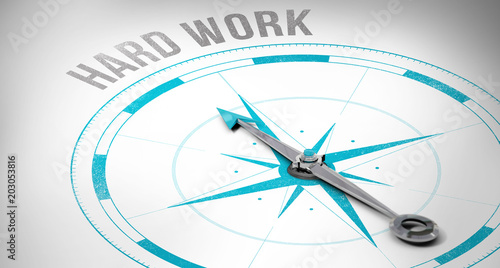 The word hard work against compass