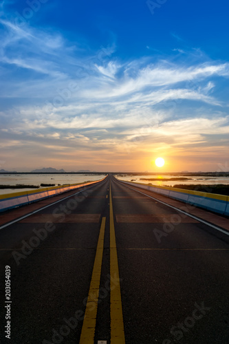 Sunset sky with road