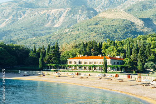 The most beautiful resort of the Budva riviera surrounded by park, famous Queen's Beach, The Villa Milocer, Montenegro. photo