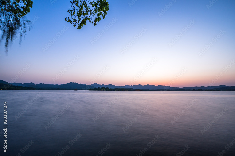 sunset of lake in hangzhou china sunset of lake in hangzhou china