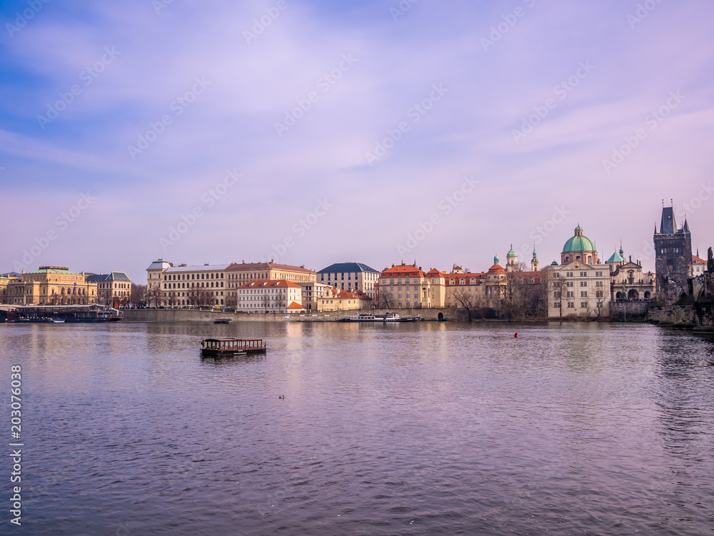 landscape view from charles bridge with boat and ship Vltava river beautiful old town prague .czech republic.