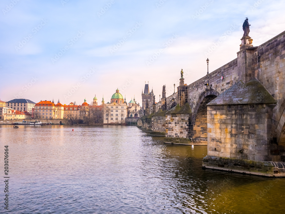 Fototapeta premium Charles bridge in Prague Czech Republic during sunset, close-up.Beautiful romantic for couple traveler.