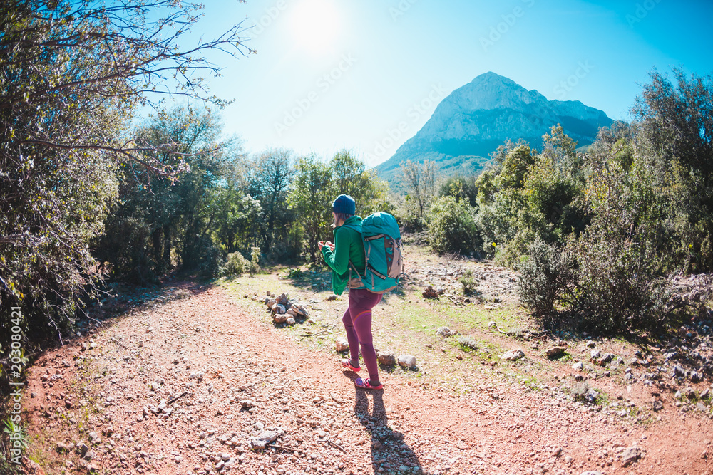 Fototapeta premium A woman is traveling with a backpack.