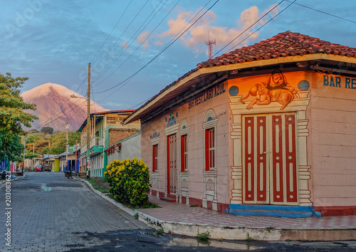 Ometepe Island, Nicaragua, Central America - May 5, 2017: Sunset in the streets of Ometepe Island with the Concepción volcano covered with clouds in the background
