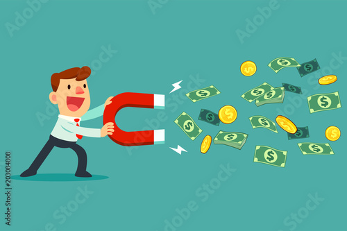 businessman use large magnet to attract money