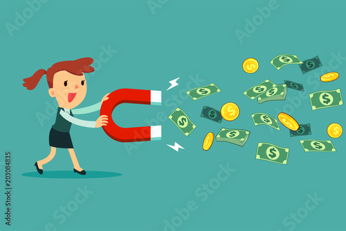 businesswoman use large magnet to attract money