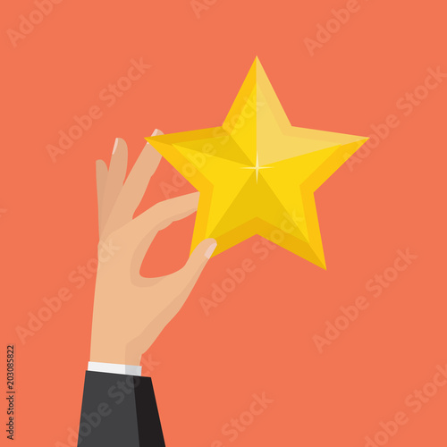 Hand holds golden star. Vector illustration