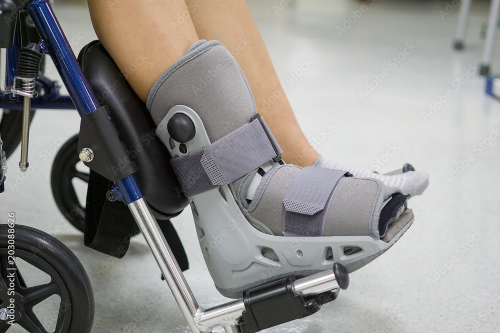 Orthopaedic Boot to a Patient. medical orthopedic concept. Stock Photo