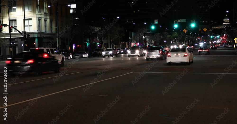 Traffic night Salt Lake City Utah urban Capitol fast motion. Night traffic transportation main street in Salt Lake City, Utah. Business District buildings. Capitol city of state. Tourist destination. Traffic night Salt Lake City Utah urban Capitol fast motion. Night traffic transportation main street in Salt Lake City, Utah. Business District buildings. Capitol city of state. Tourist destination.