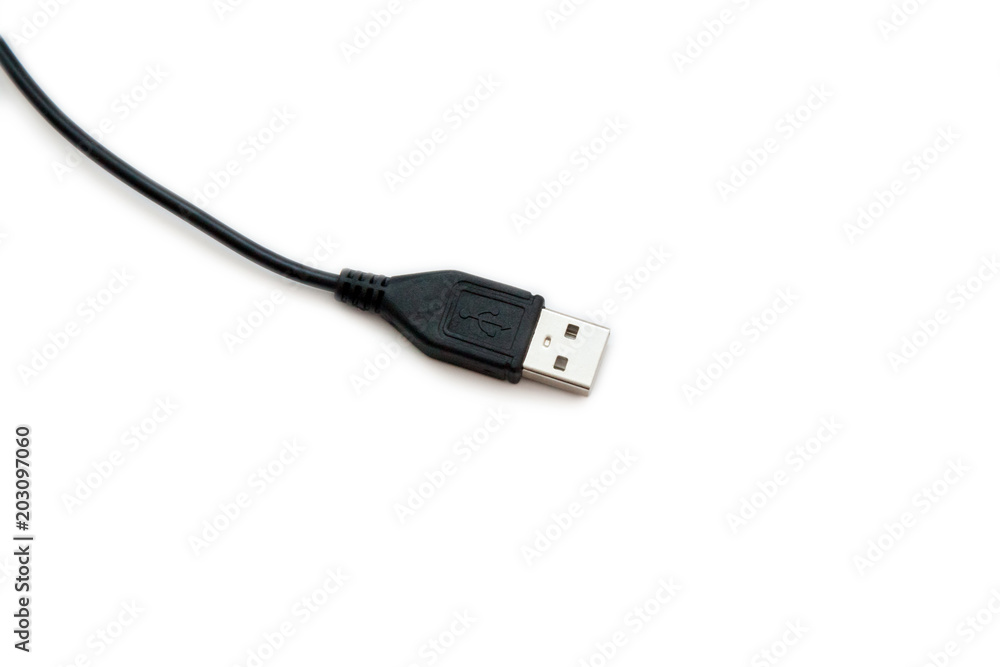 Black USB cable on white background. Connector close-up. Black USB cable on white background. Connector close-up.