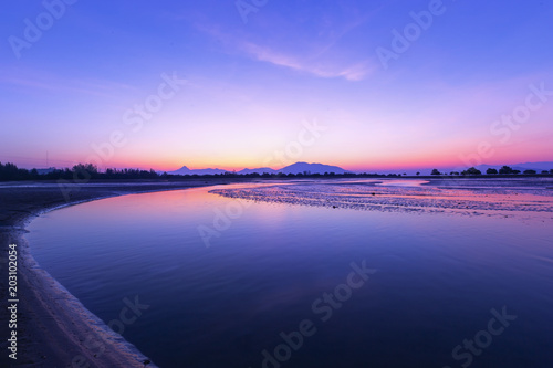 Beautiful sunrise in the morning  reflection on the water