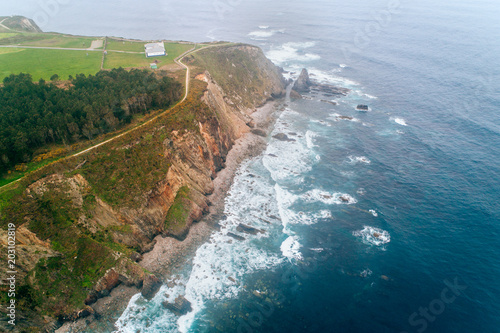 Aerial view of a lighthouse on a cliff