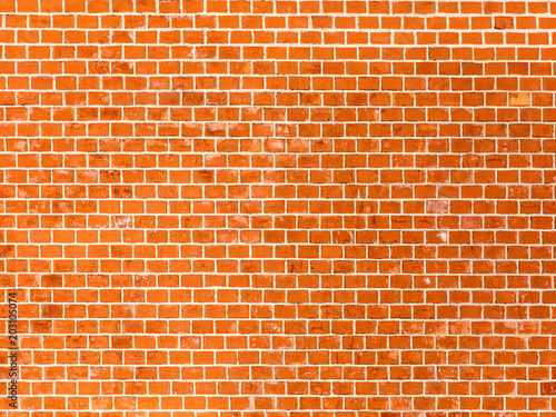 Wall of red bricks as an abstract background