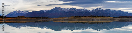Mountain range reflecting in Lake Argentina