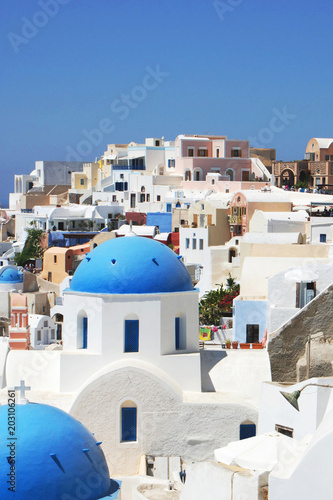 White house on the Santorini Island in Greece, cityscape wiht blue clear sky and white architecture
