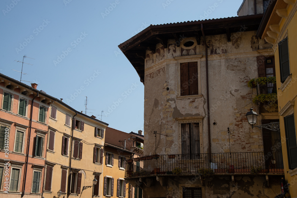 old building painted, house near Ponte Pietra, Verona, Italy