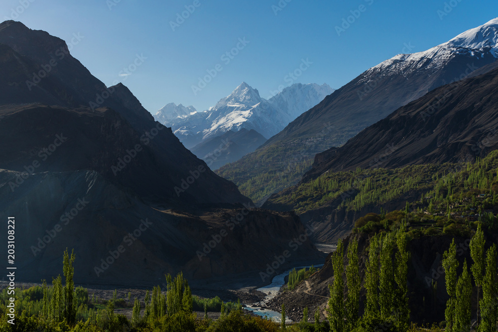 Valley mountains landscape, forest and mountain range in summer at Hunza valley Pakistan