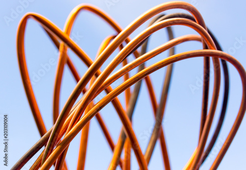 Copper wire against the blue sky