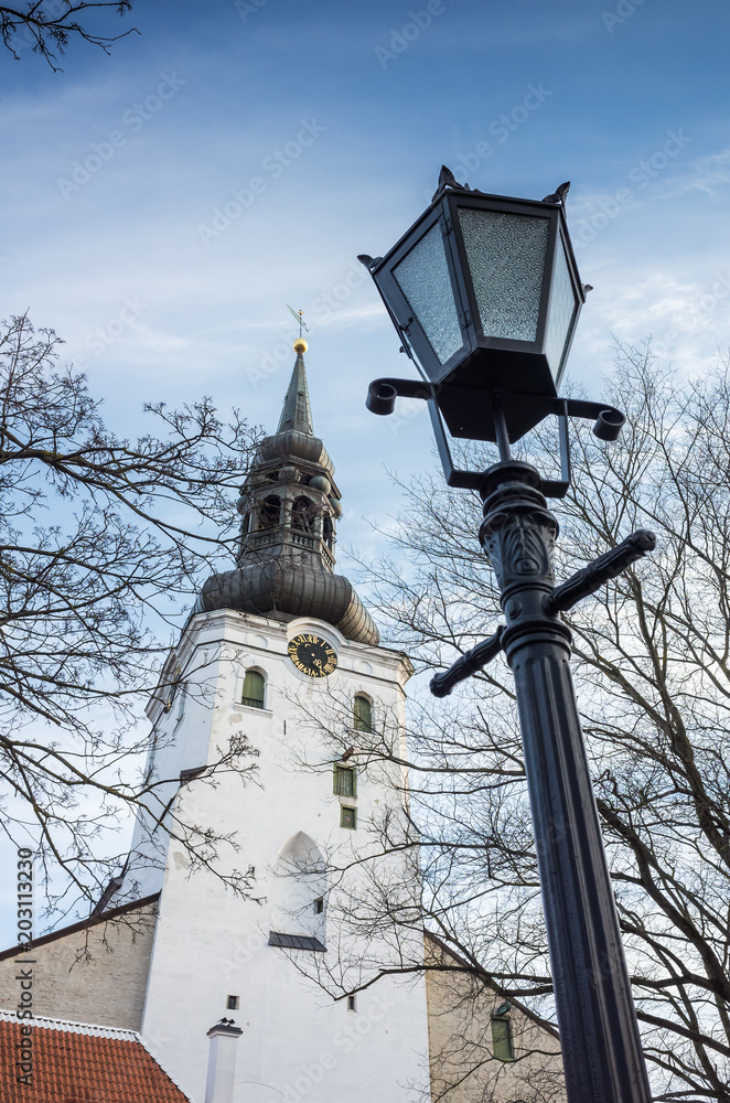 Tallinn old town, street light with tall church
