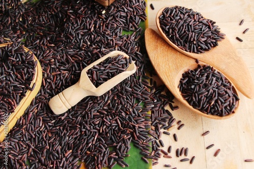 Black jasmine rice or organic riceberry rice photo