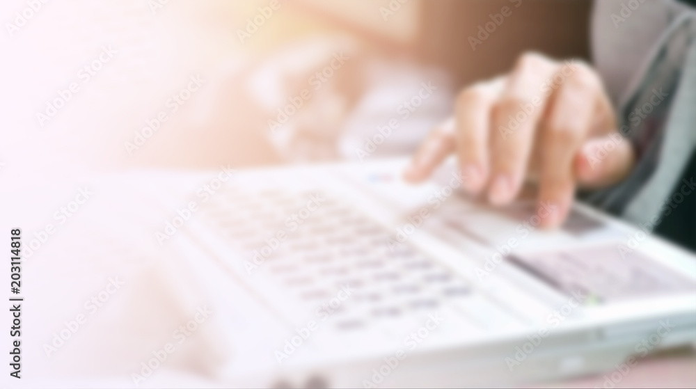 blurred background hand on keyboard, insurance concept blurred background hand on keyboard, insurance concept