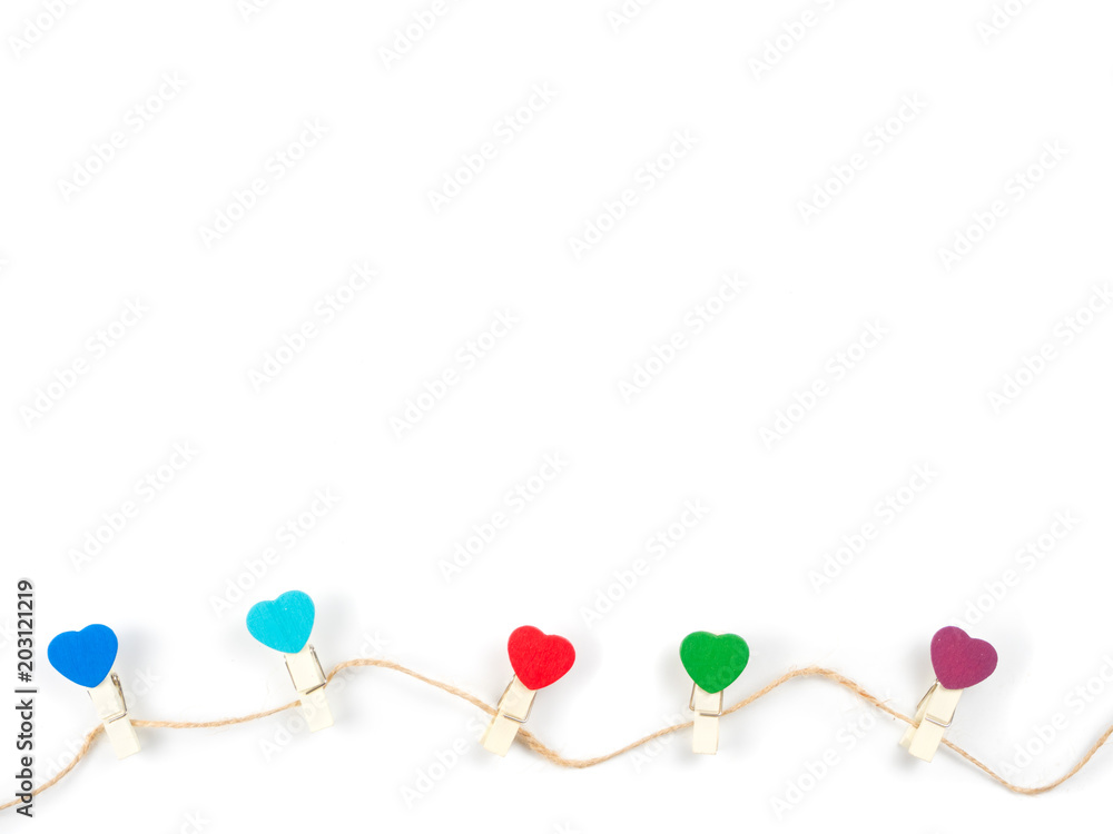 Top View Wooden colorful Paper Clip Heart set with rope wooden isolate on white background. Concept in love in office, copy paste Top View Wooden colorful Paper Clip Heart set with rope wooden isolate on white background. Concept in love in office, copy paste