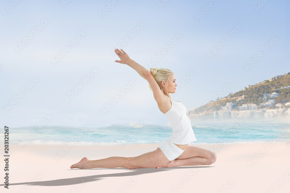 Toned young woman stretching hands backwards against beautiful beach and blue sky Toned young woman stretching hands backwards against beautiful beach and blue sky