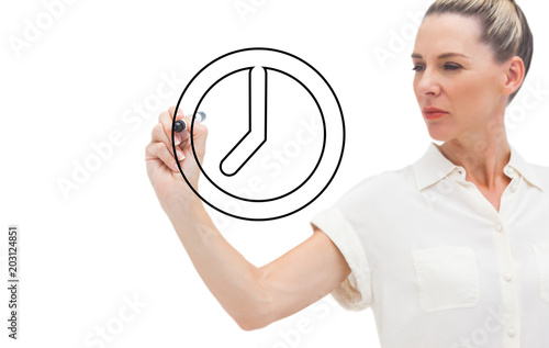 Composite image of business person drawing a clock on white background