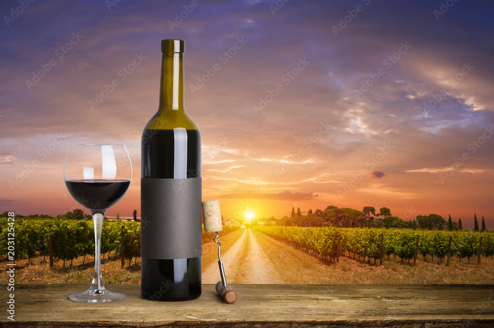 Red wine glasses and bottle on stone background. Top view with copy space Red wine glasses and bottle on stone background. Top view with copy space