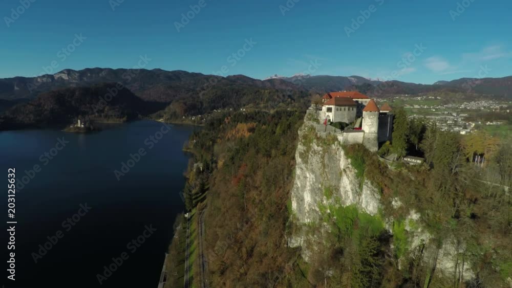 Aerial view of Bled castle on a lake shore Aerial view of Bled castle on a lake shore