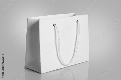 White Paper Shopping Bag on gray Background for Mockups