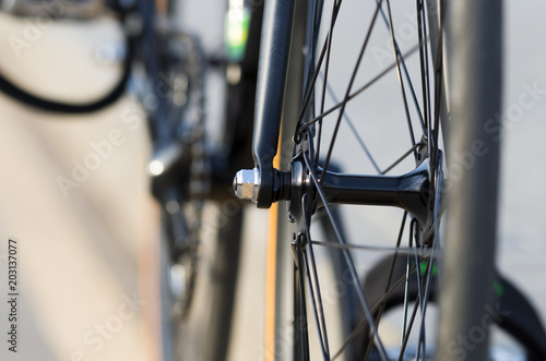 Front bicycle wheel, hub and spokes