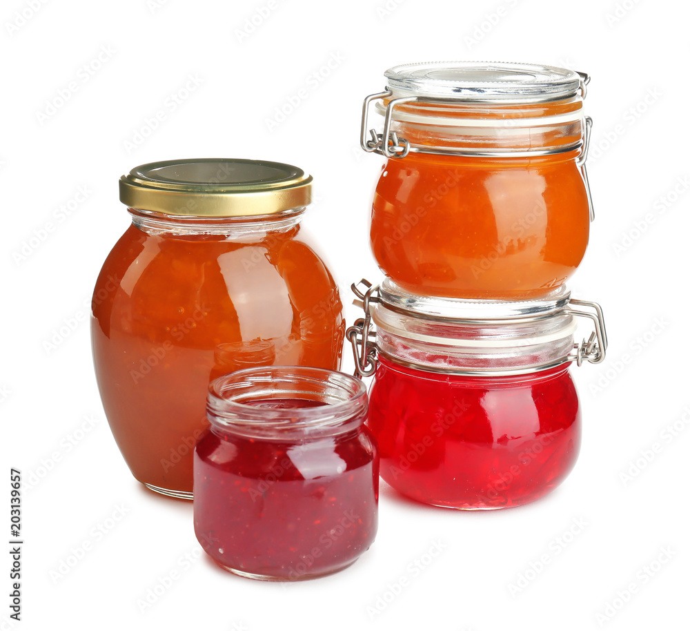 Jars with different sweet jam on white background Jars with different sweet jam on white background