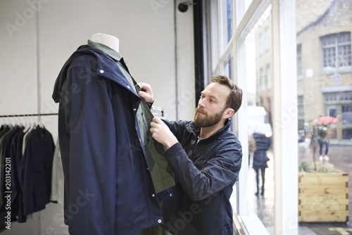 Portrait of a male fashion retailer