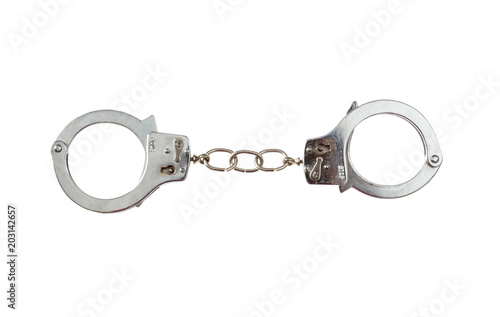 Metal handcuffs isolated on white background, top view