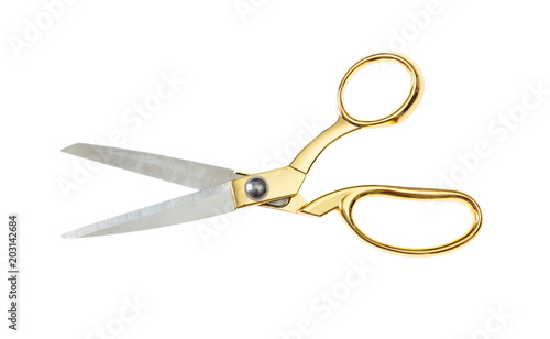 Open pair of scissors isolated on white background, top view photo