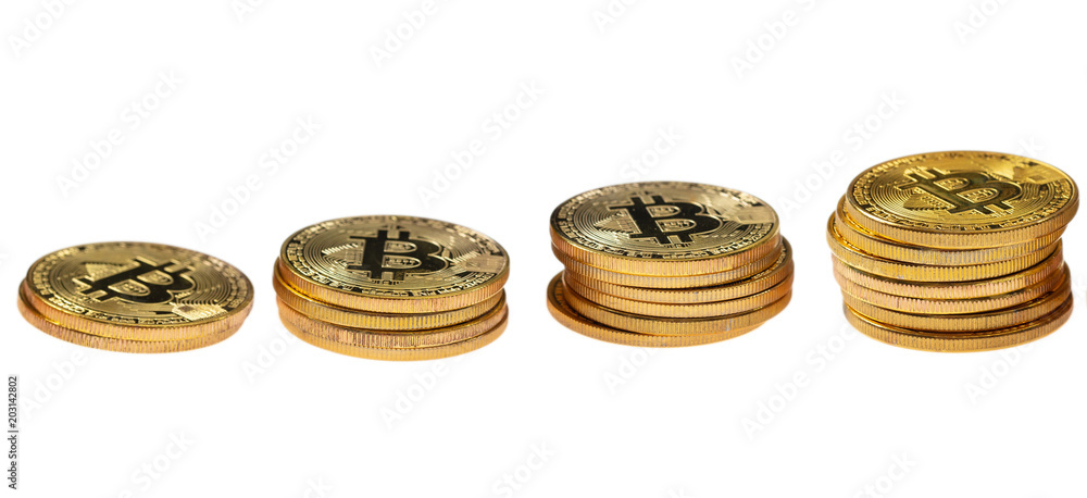 Cryptocurrency growth. Bitcoins isolated on white background