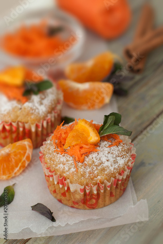 Carrot Healthy Muffins Cupcakes Buns on a WoodenRustic board. Homemade Food. photo