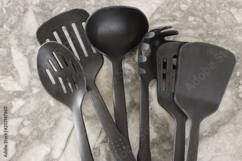 Black plastic kitchen cooking utensils