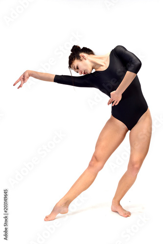 Young girl gymnast on white background (isolation on white)