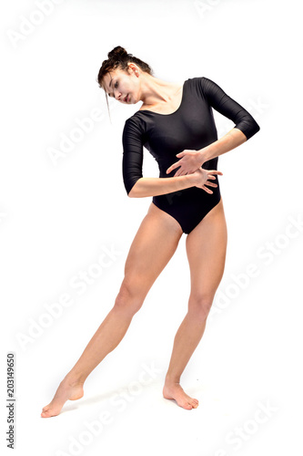 Young girl gymnast on white background (isolation on white)