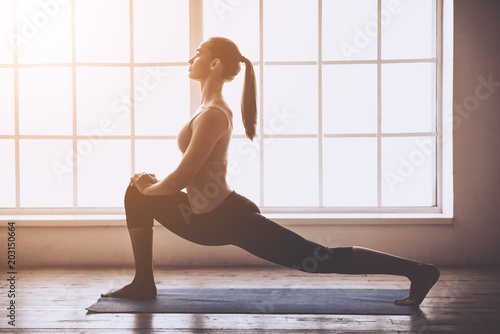 Young woman doing yoga photo