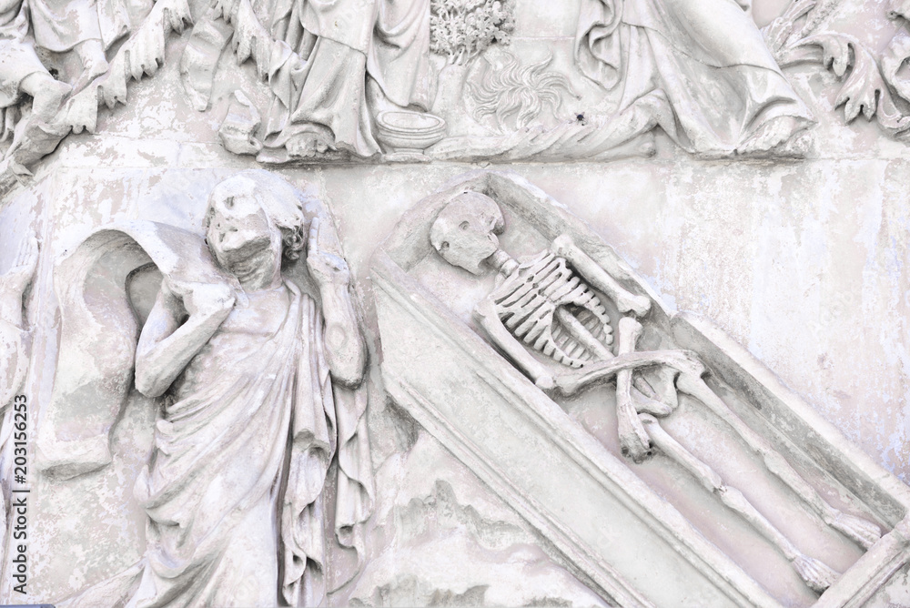 Detail of the facade of the Duomo of Orvieto, Italy. Marble bas-relief representing episodes of the bible