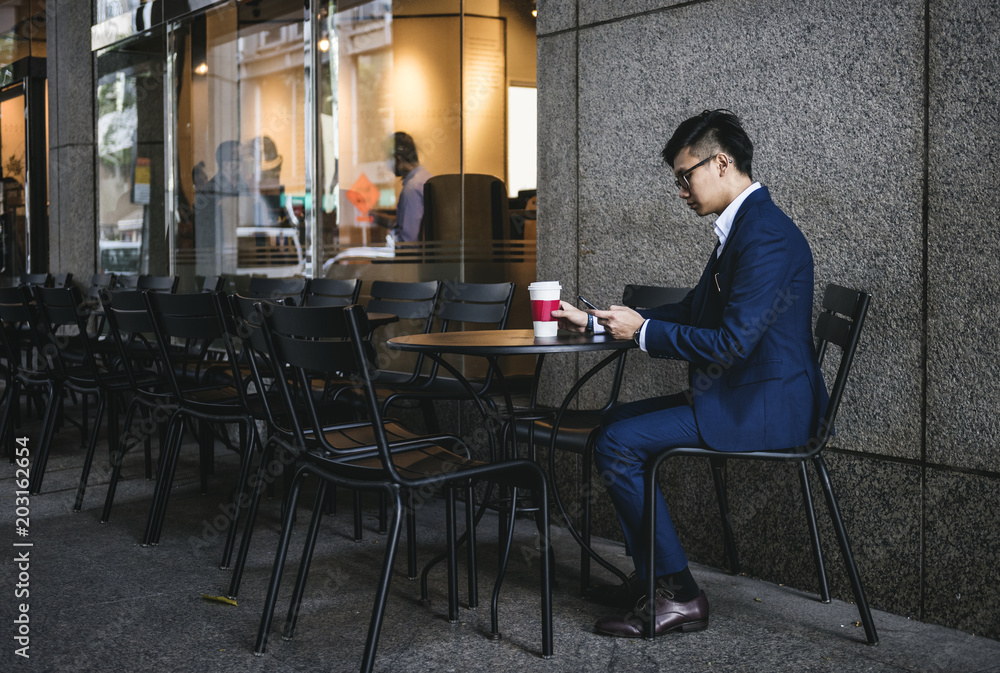Asian businessman in a cafe Asian businessman in a cafe