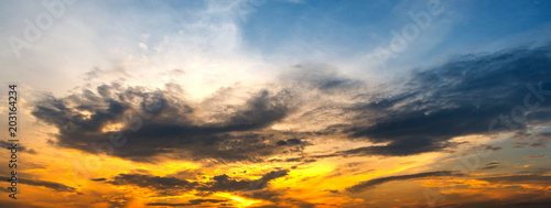 Sunlight with dramatic sky on dark background.Vivid sky on dark cloud.